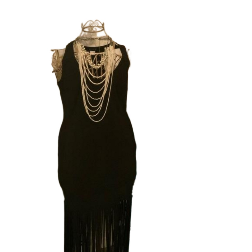 Women size large black dress with fringes aka car wash style dress.